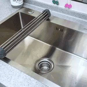 Escurridor multiusos de acero inoxidable para cocina.